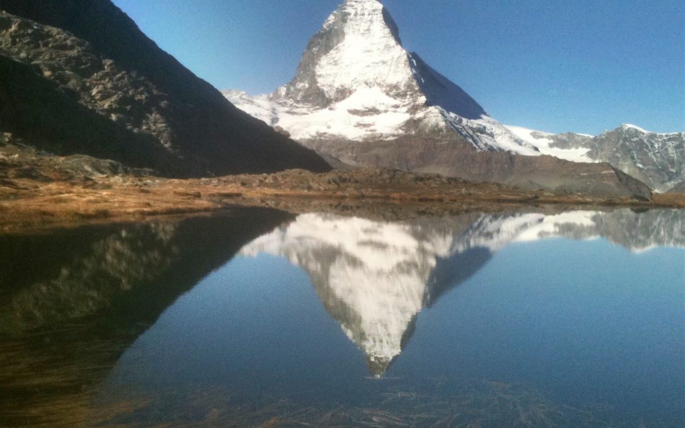 Private chauffeur route planning across Swiss lakes and Alps